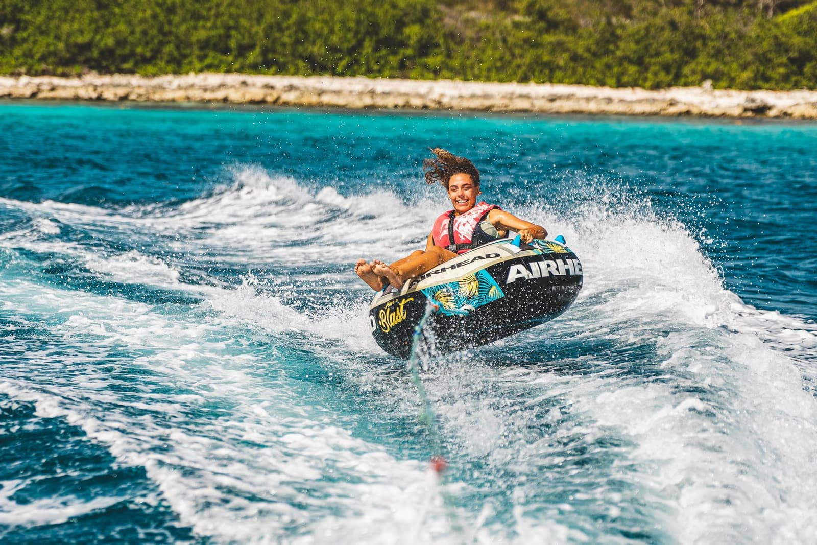 Tubing behind the boat on Bonaire’s flat water